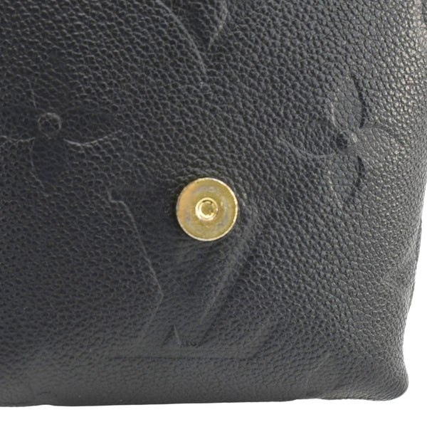 LOUIS VUITTON Tiny Monogram Empreinte Leather Backpack Black