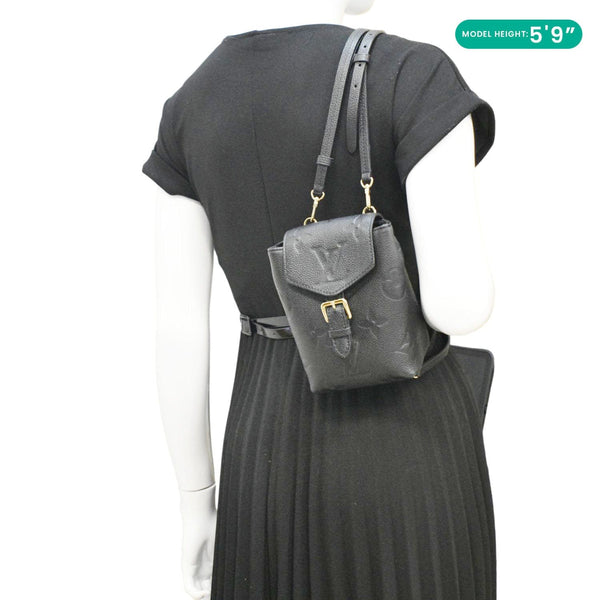 LOUIS VUITTON Tiny Monogram Empreinte Leather Backpack Black