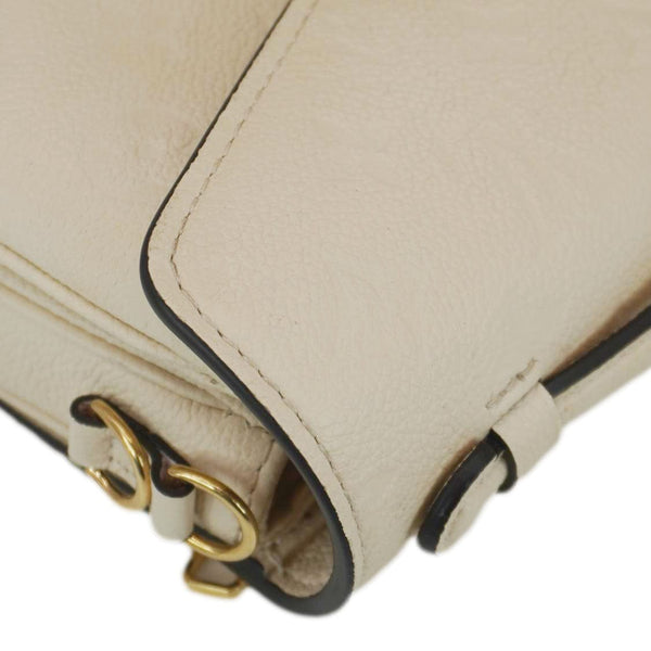 LOUIS VUITTON Metis East West Pochette Empreinte Leather Crossbody Bag Cream