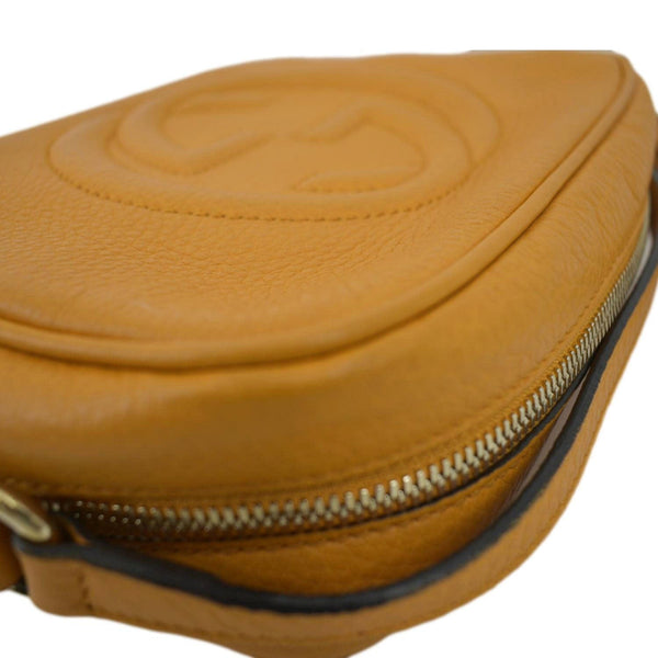 GUCCI Soho Disco Elegance: Leather Crossbody Bag Orange with zip view