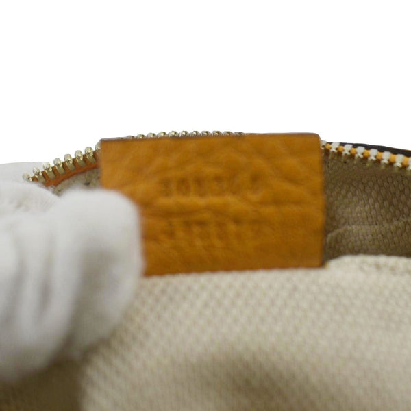 GUCCI Soho Disco Elegance: Leather Crossbody Bag Orange with code