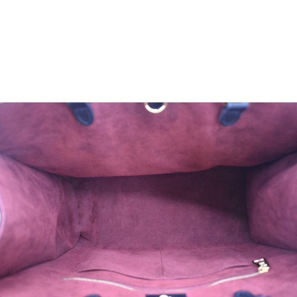 LOUIS VUITTON Onthego MM Giant Monogram Empreinte Leather Tote Bag Bicolor