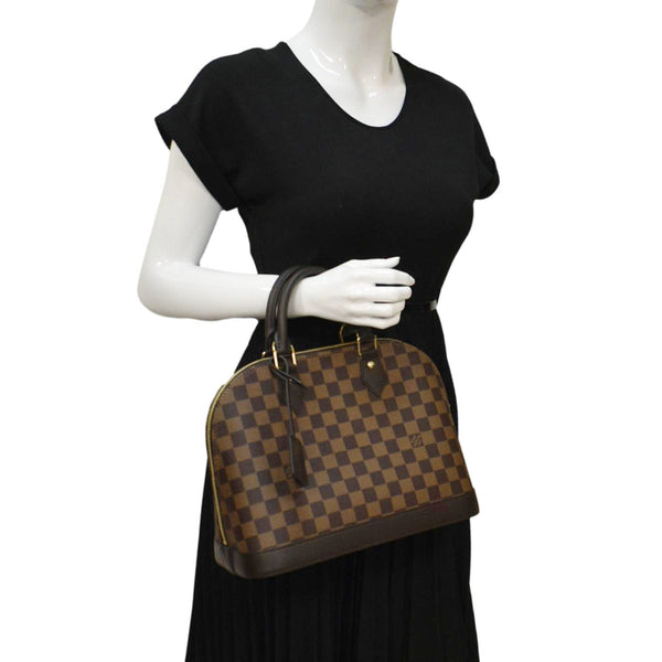 LOUIS VUITTON Alma PM Damier Ebene Satchel Bag Brown