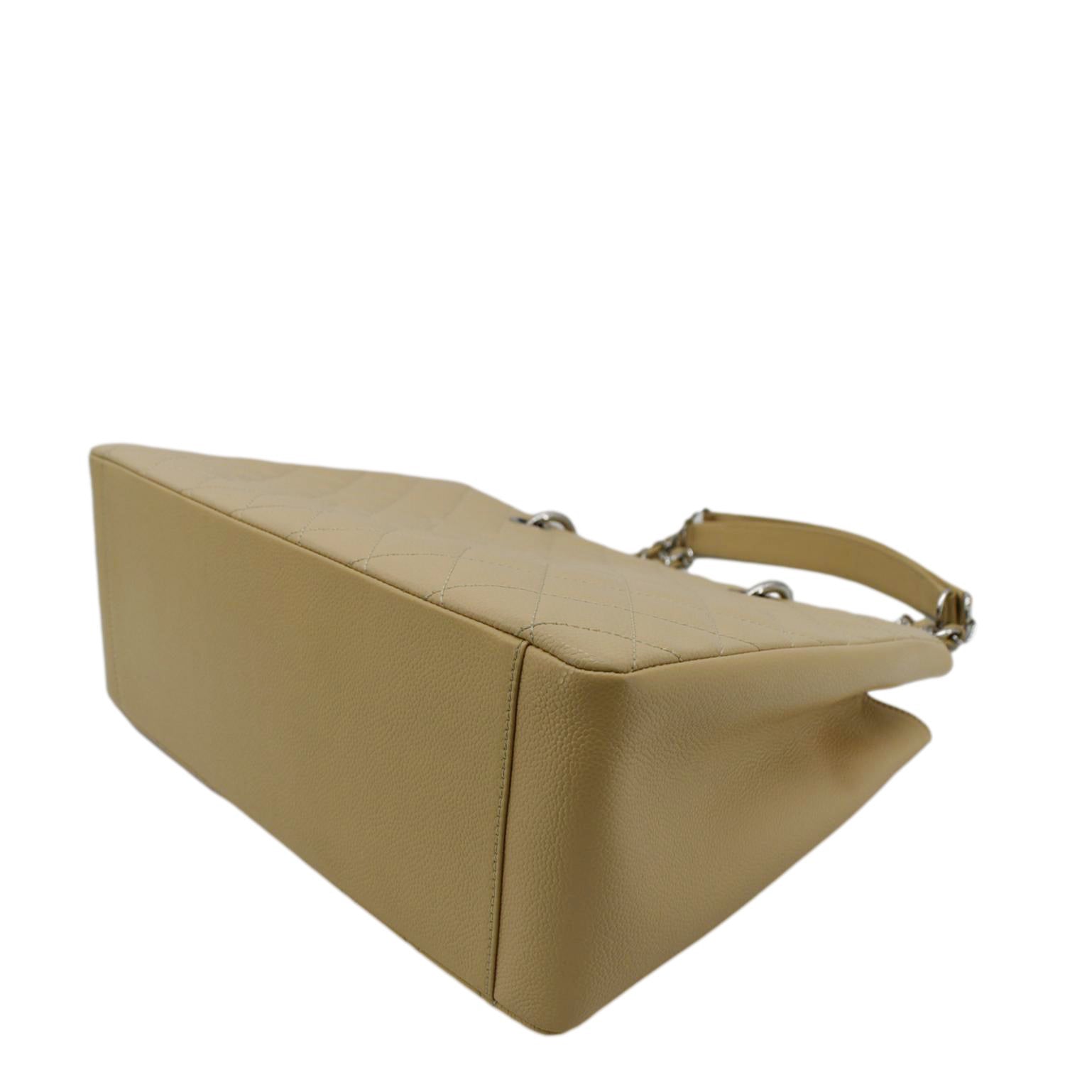 chanel beige matte caviar travel tote bag Leather Beige Exterior side is discolored and stained with transfer of color 22A Dark Beige Caviar Quilted