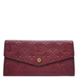 LOUIS VUITTON Sarah Leather Wallet Aurore front look