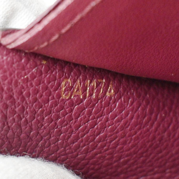 LOUIS VUITTON Sarah Monogram Empreinte Leather Wallet Aurore