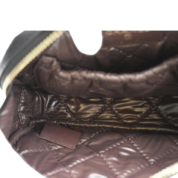 CHANEL Curvy Small Quilted Caviar Leather Cosmetic Pouch Black