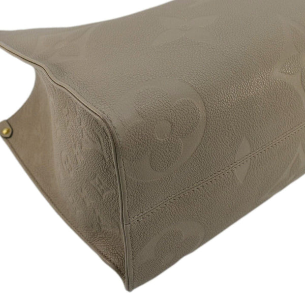 LOUIS VUITTON Onthego MM Monogram Empreinte Shoulder Bag Tourterelle