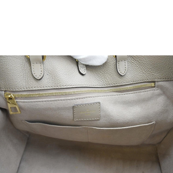 LOUIS VUITTON Onthego MM Monogram Empreinte Shoulder Bag Tourterelle