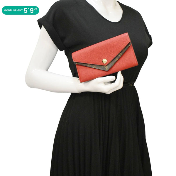 LOUIS VUITTON Double V Leather Wallet Red