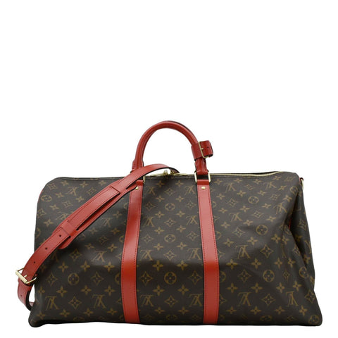 LOUIS VUITTON Keepall 55 Bandouliere Monogram Canvas Travel Bag Red