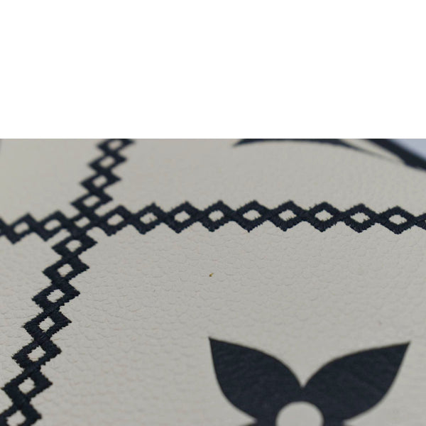LOUIS VUITTON Broderies Neverfull MM Giant Empreinte Monogram Tote Bag Cream