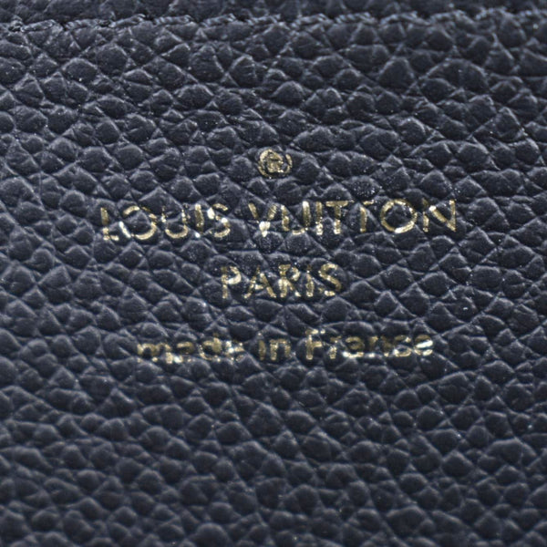 LOUIS VUITTON Zip Around Monogram Empreinte Leather Wallet Bicolor