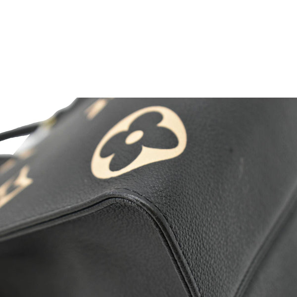 LOUIS VUITTON Onthego MM Giant Monogram Empreinte Leather Tote Bag Bicolor