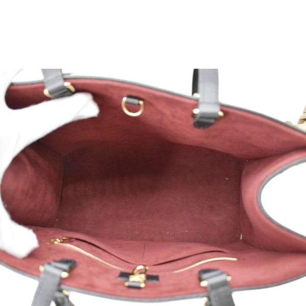 LOUIS VUITTON Onthego MM Giant Monogram Empreinte Leather Tote Bag Bicolor