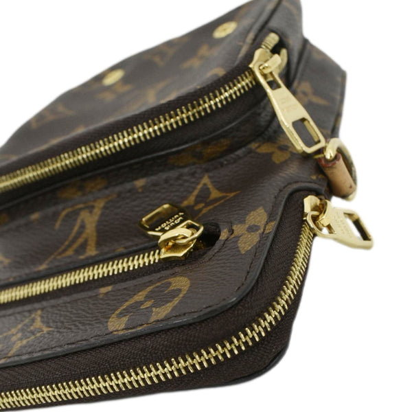 LOUIS VUITTON Utility Phone Sleeve Monogram Canvas Crossbody Bag Brown