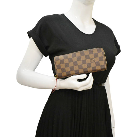 LOUIS VUITTON Clemence Damier Ebene Zippy Wallet Brown