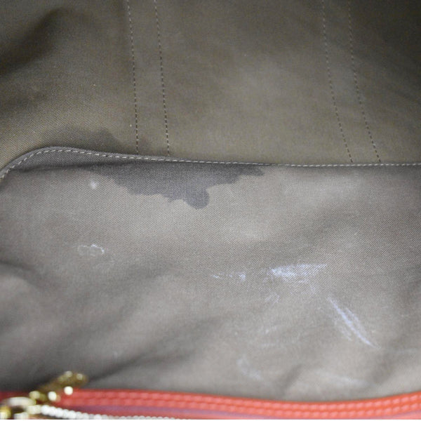 LOUIS VUITTON Keepall 50 Bandouliere Monogram Canvas Travel Bag Red