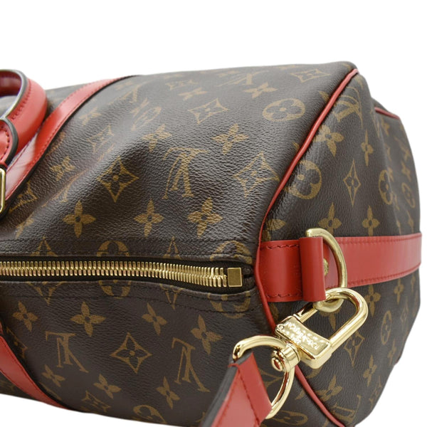 LOUIS VUITTON Keepall 50 Bandouliere Monogram Canvas Travel Bag Red