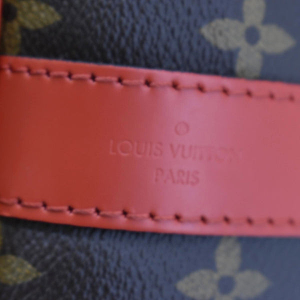 LOUIS VUITTON Keepall 50 Bandouliere Monogram Canvas Travel Bag Red