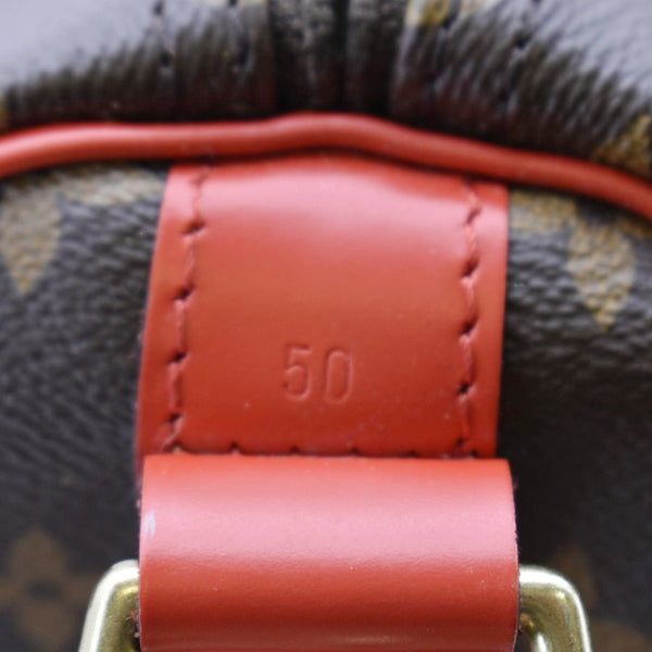 LOUIS VUITTON Keepall 50 Bandouliere Monogram Canvas Travel Bag Red