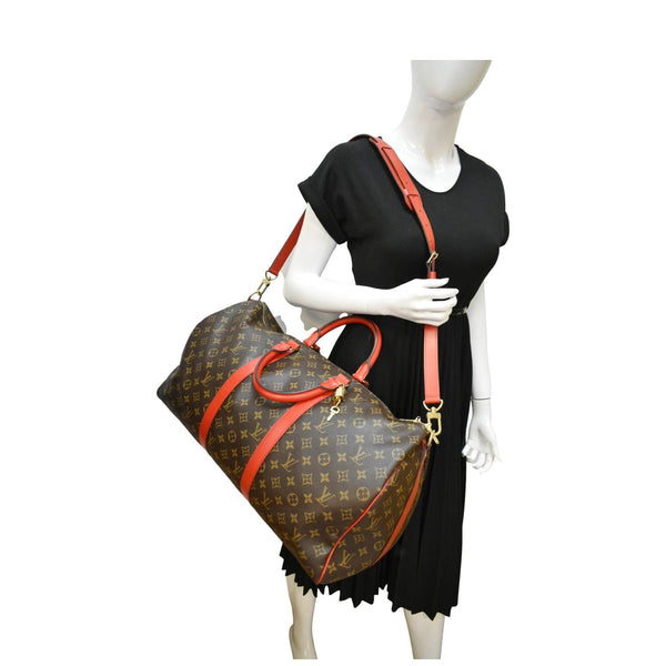 LOUIS VUITTON Keepall 50 Bandouliere Monogram Canvas Travel Bag Red