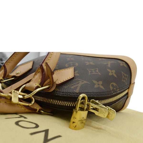 LOUIS VUITTON Alma BB Monogram Canvas Crossbody Bag Brown right corner look