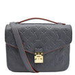 LOUIS VUITTON Metis Pochette Empreinte Leather Crossbody Bag Navy Blue front look