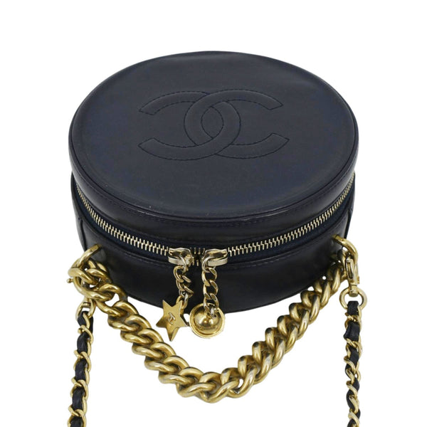 CHANEL Navy Glazed Round As Earth Leather Crossbody Bag with land scape view