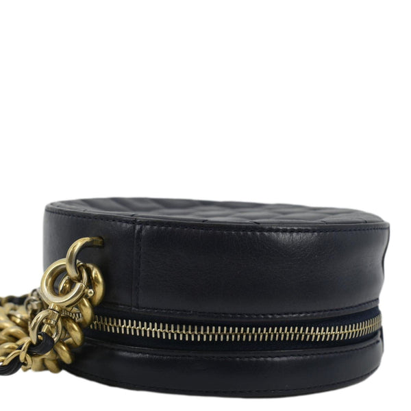 CHANEL Navy Glazed Round As Earth Leather Crossbody Bag with right side chain view