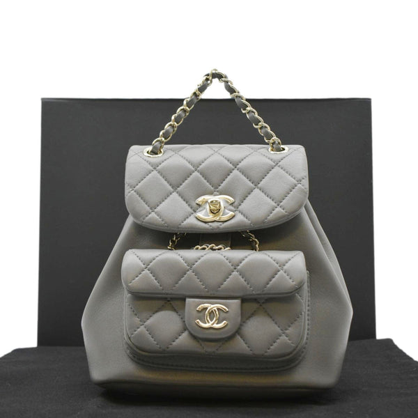 CHANEL Gray leather backpack with gold chain