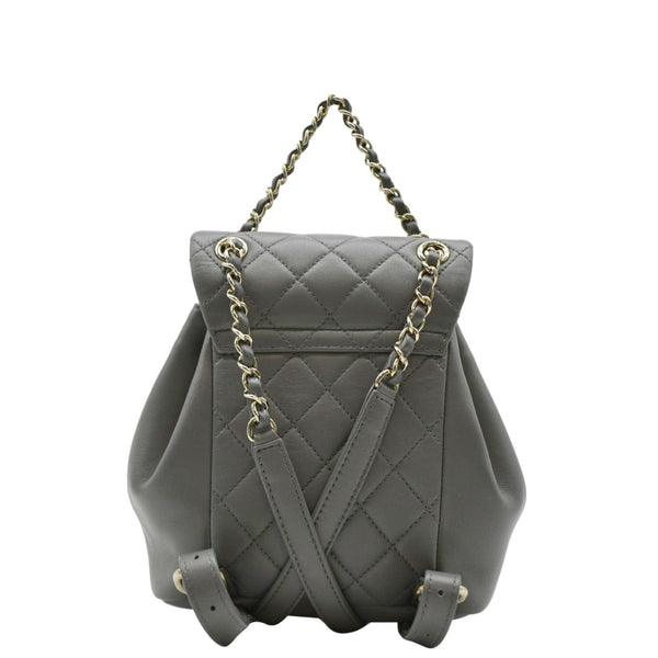 CHANEL Gray quilted leather backpack with gold chain handle
