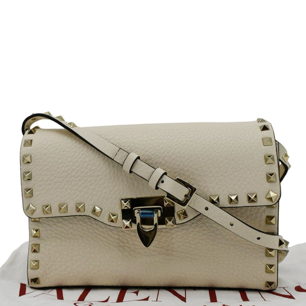 VALENTINO Rockstud Flip Lock Leather Shoulder Bag Off White front look