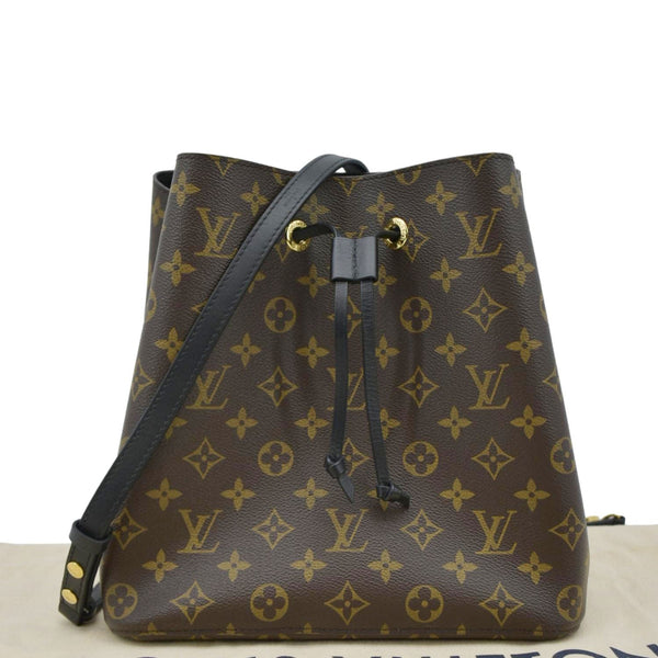 LOUIS VUITTON Brown Louis Vuitton bucket bag with black strap