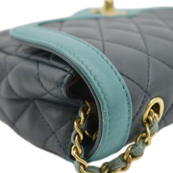 CHANEL Black crossbody bag with gold chain & quilted texture