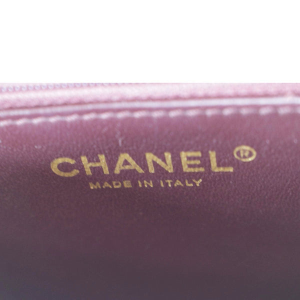 CHANEL Black leather crossbody bag with gold chain strap