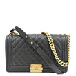 CHANEL Medium Boy Flap Caviar Quilted Leather Shoulder Bag Black front look