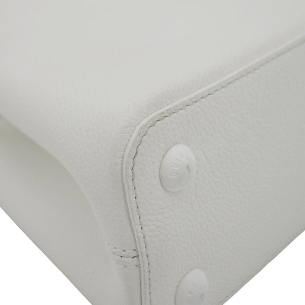 LOUIS VUITTON Small White leather tote bag with gold chain strap