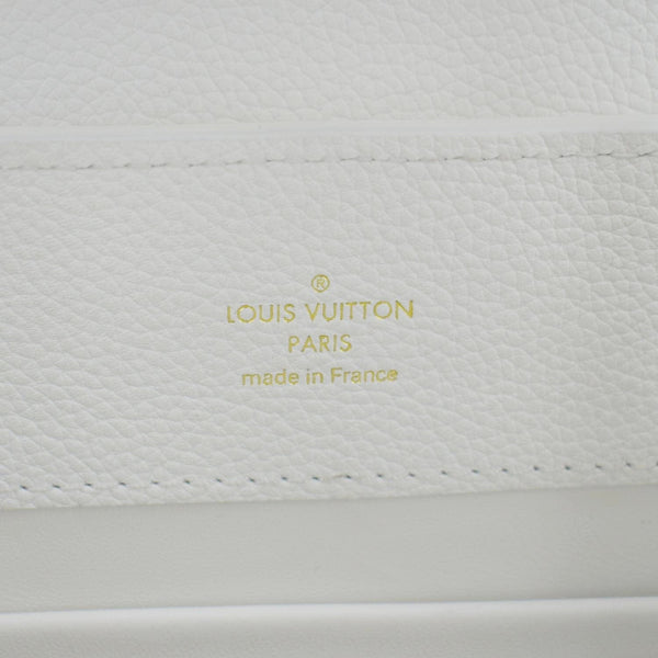 LOUIS VUITTON White tote bag with colorful floral embroidery 