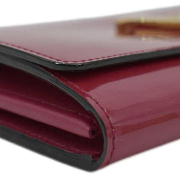 LOUIS VUITTON Black leather satchel bag with gold hardware