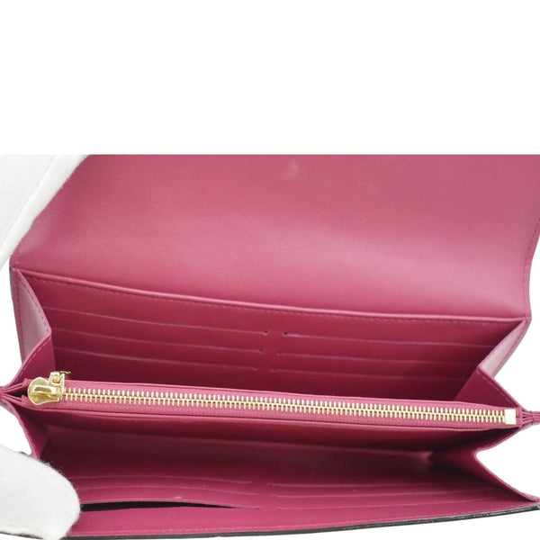 LOUIS VUITTON Pink leather wallet with gold zipper