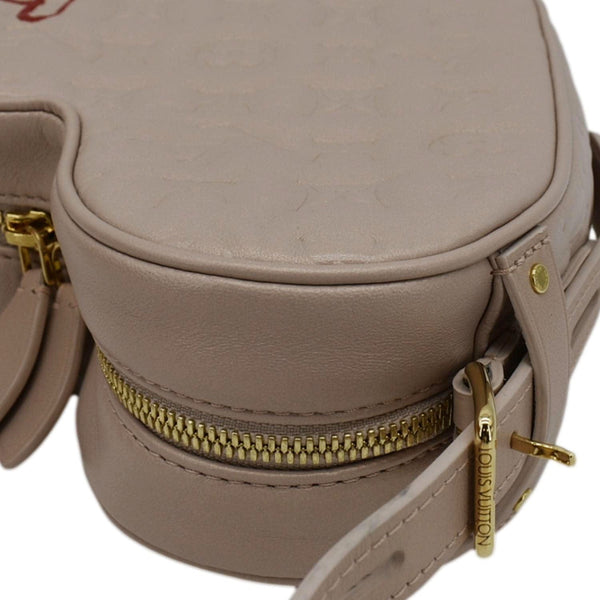 LOUIS VUITTON Fall In Love Sac Coeur Monogram Embossed Crossbody Bag Light Pink