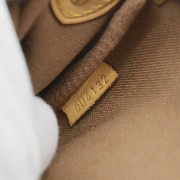 LOUIS VUITTON Pochette Eva Monogram Canvas Crossbody Bag Brown