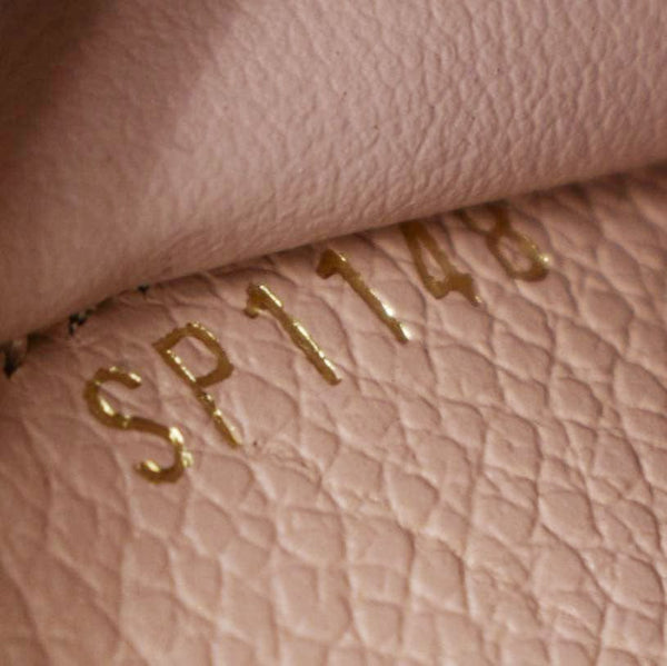 LOUIS VUITTON Clemence Empreinte Leather Wallet Dusty Pink