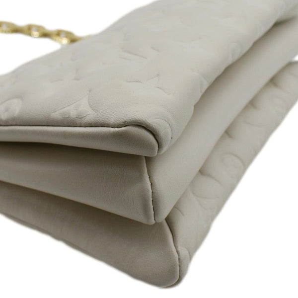 LOUIS VUITTON Creme Shoulder Bag lower left side look