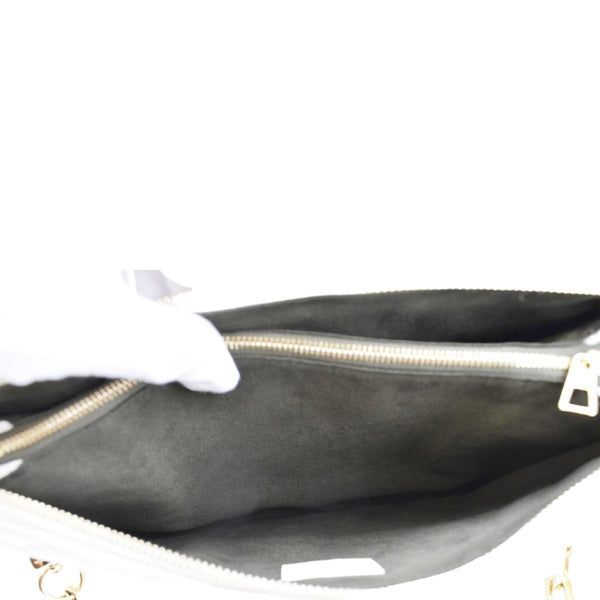 LOUIS VUITTON Creme Shoulder Bag inside look