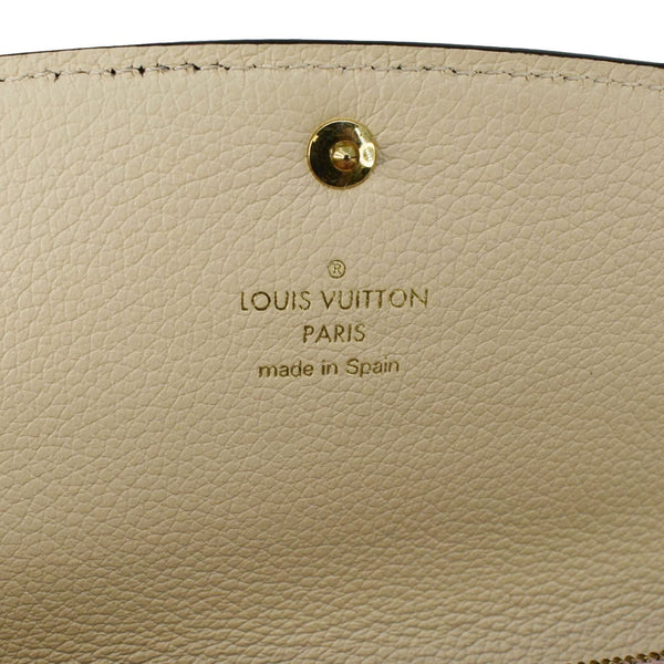 LOUIS VUITTON Sarah Monogram Empreinte Leather Wallet Pink