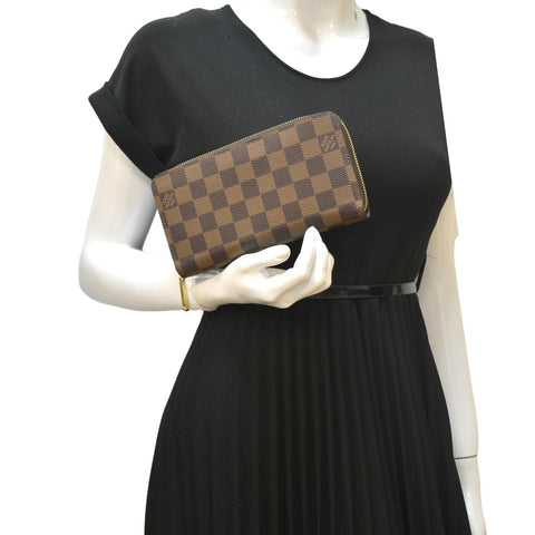 LOUIS VUITTON Damier Ebene Zippy Wallet Brown
