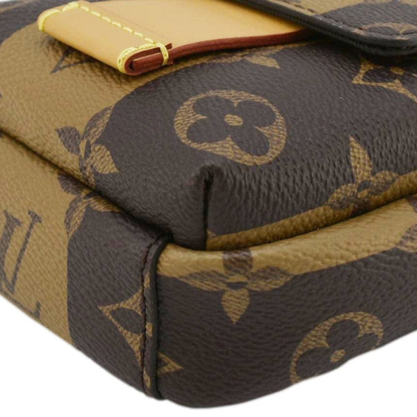 LOUIS VUITTON x Nigo Double Flap Reverse Monogram Canvas Phone Pouch Brown