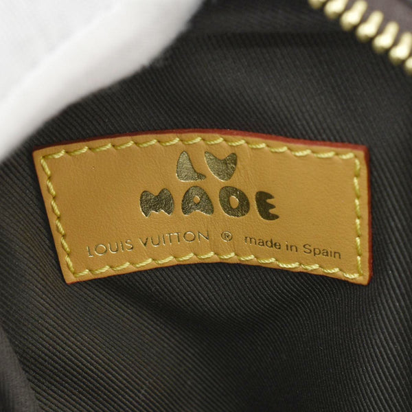 LOUIS VUITTON x Nigo Double Flap Reverse Monogram Canvas Phone Pouch Brown